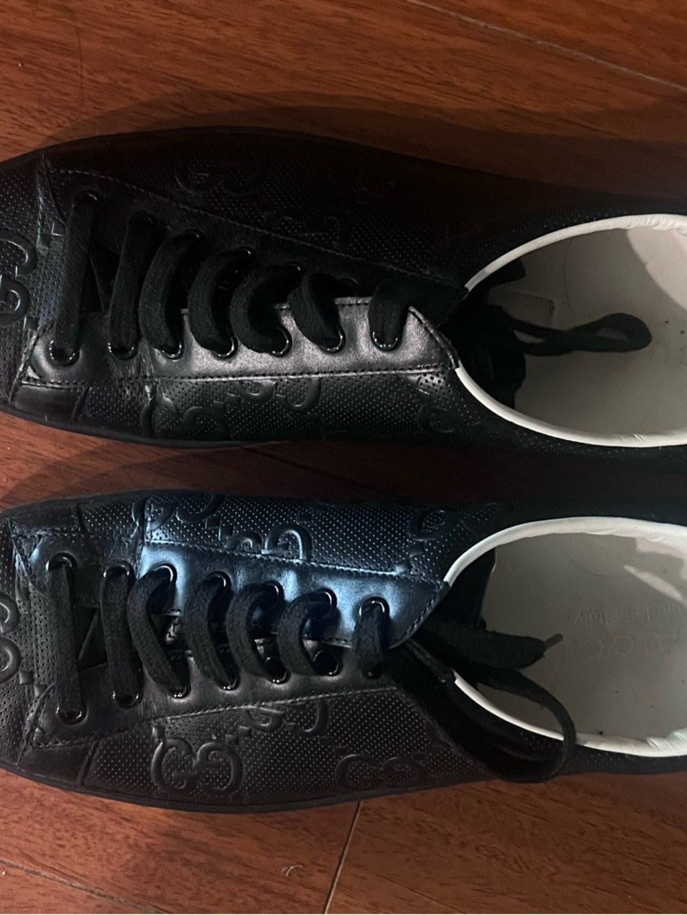 Gucci Black Leather GG Embossed Low-Top Sneakers with White Trim